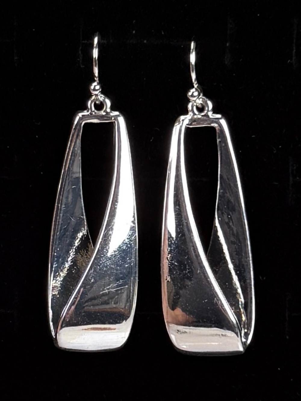 Pretty Silvertone weighted Anne Klein minimalist pierced earrings
